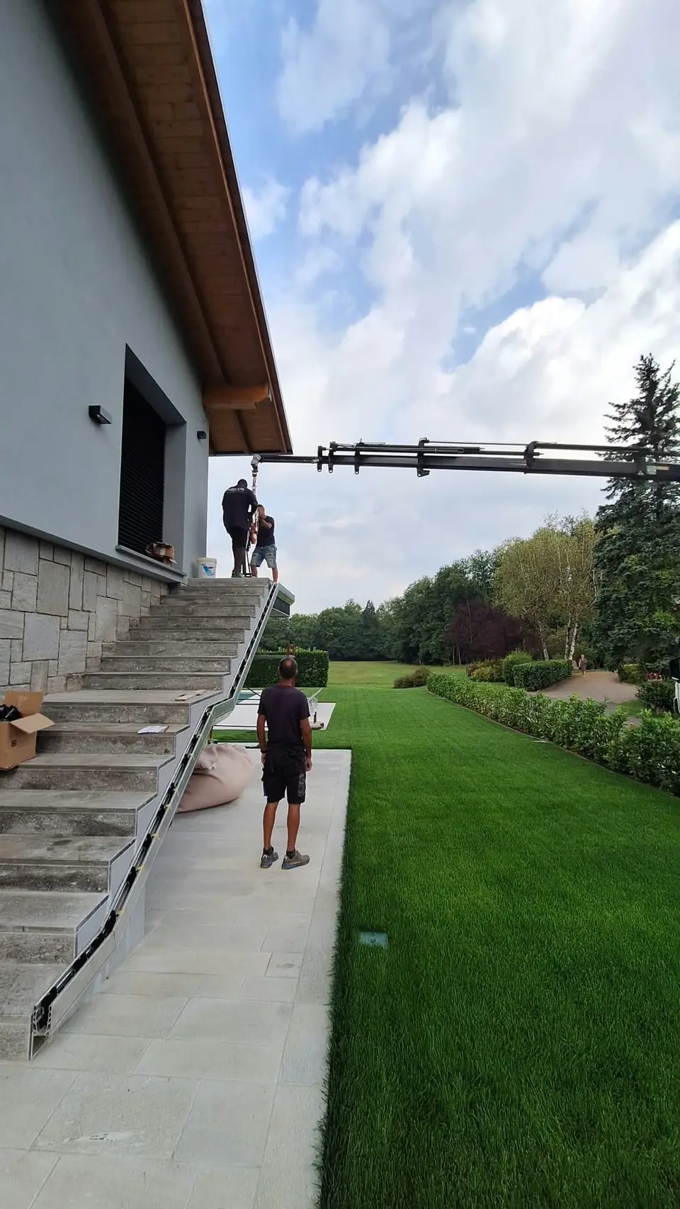 Garden with new lawn next to an outdoor staircase