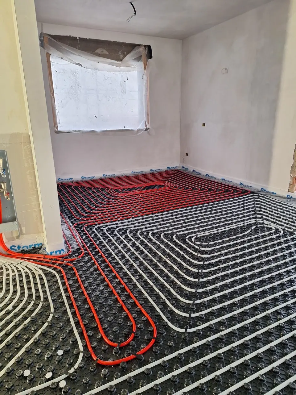 Underfloor heating being installed