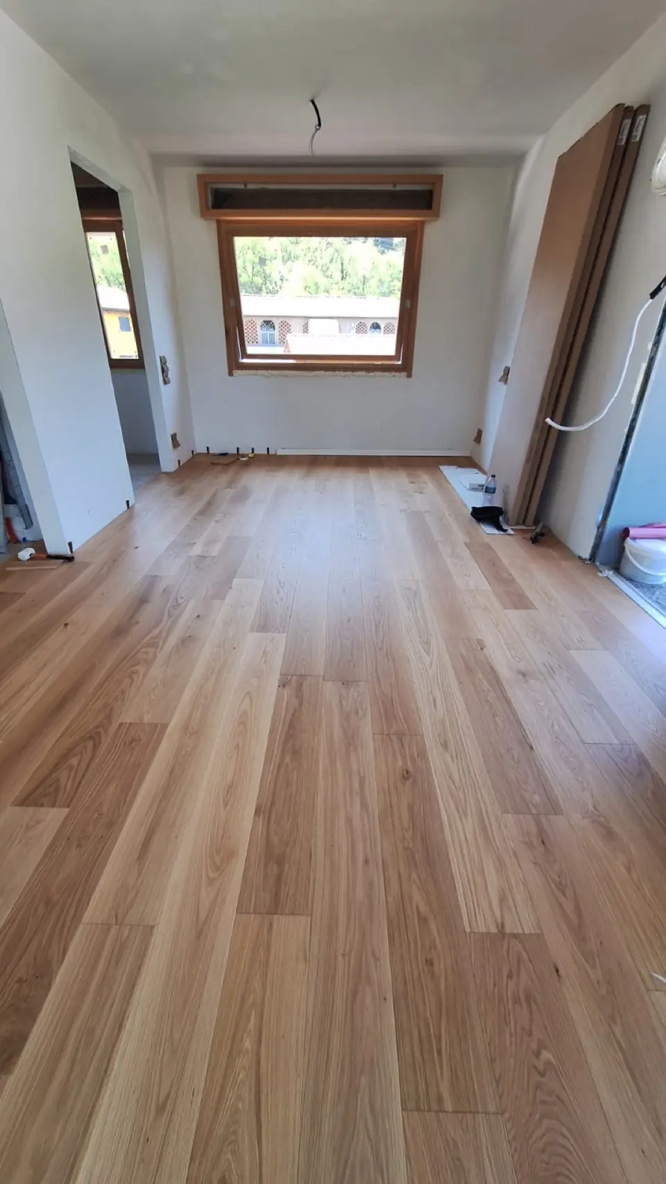 Room with new parquet flooring after renovation